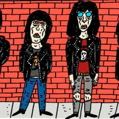 Cuatro figuras con chaquetas de cuero y pelo negro, un ícono del origen del punk, posan frente a un muro de ladrillos rojos.