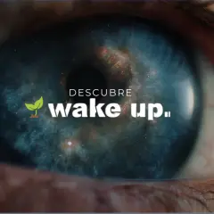 Ojo abierto con galaxia en la pupila y el texto "Descubre wake up festival".