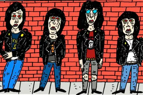 Cuatro figuras con chaquetas de cuero y pelo negro, un ícono del origen del punk, posan frente a un muro de ladrillos rojos.