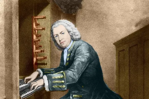 Johann Sebastian Bach, tocando el órgano, quizás componiendo su obra más famosa de Bach.