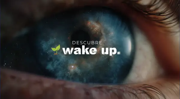 Ojo abierto con galaxia en la pupila y el texto "Descubre wake up festival".