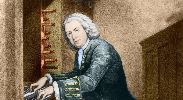 Johann Sebastian Bach, tocando el órgano, quizás componiendo su obra más famosa de Bach.