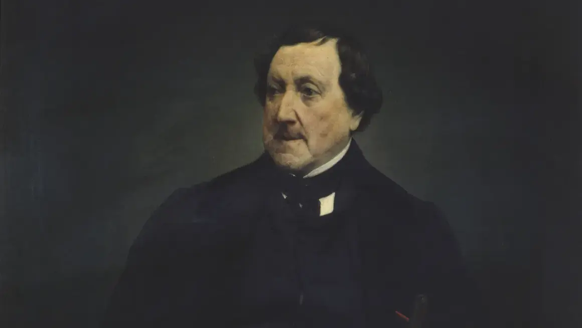 Retrato de un hombre con traje oscuro, quizás el compositor de las óperas de Rossini, con mirada pensativa.
