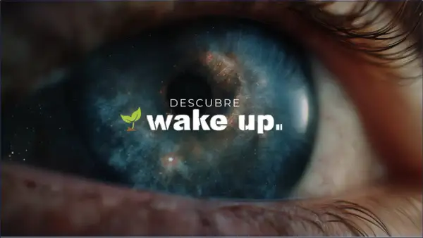 Ojo abierto con galaxia en la pupila y el texto "Descubre wake up festival".