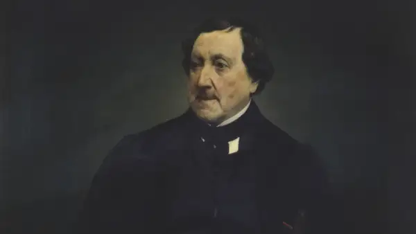 Retrato de un hombre con traje oscuro, quizás el compositor de las óperas de Rossini, con mirada pensativa.